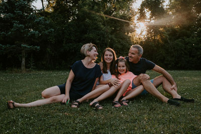 Full length portrait of friends at park