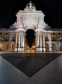 Facade of historical building at night