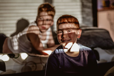 Portrait of smiling boy sitting