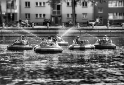 Boats in fountain in city