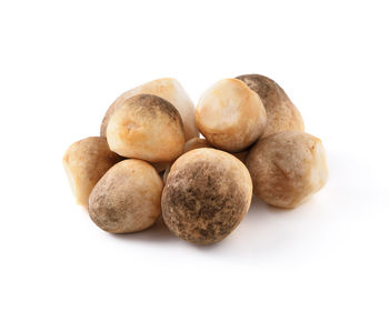 Close-up of blueberries against white background