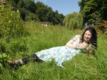 Man sitting on grassy field