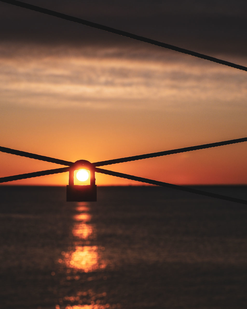 SILHOUETTE BRIDGE AGAINST SKY AT SUNSET