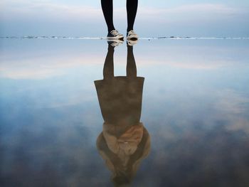 Low section of people standing in water