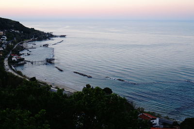 High angle view of sea against sky during sunset