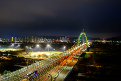 High angle view of illuminated city at night