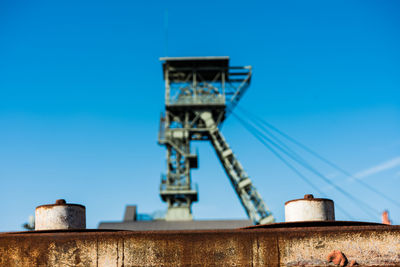Low angle view of built structure against blue sky