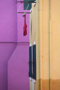 Close-up of clothes hanging on wall