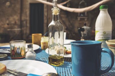 Close-up of wine bottles on table