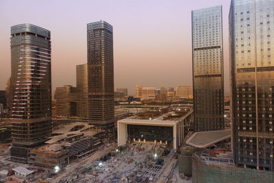 High angle view of buildings against sky during sunset