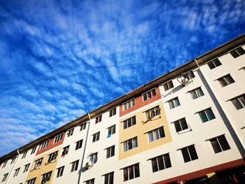 Low angle view of residential building against sky