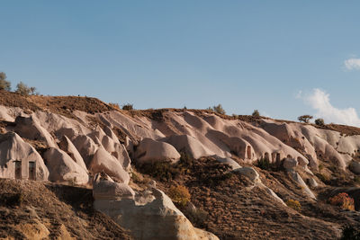 Scenic view of rocky mountains against clear sky