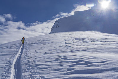 Scenic view of snowcapped mountain against sky