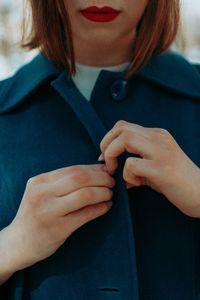 Close-up of woman holding hands