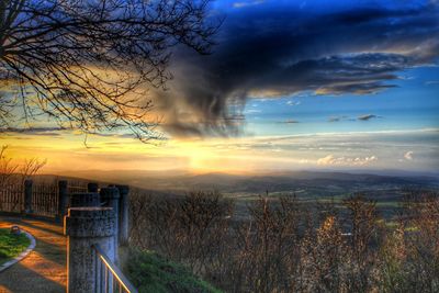 Scenic view of landscape against sky during sunset