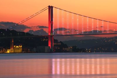 View of suspension bridge at night