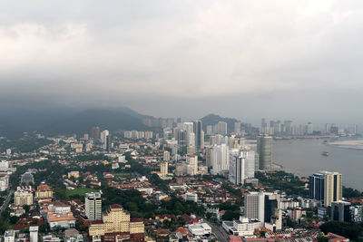 High angle view of buildings against sky in city