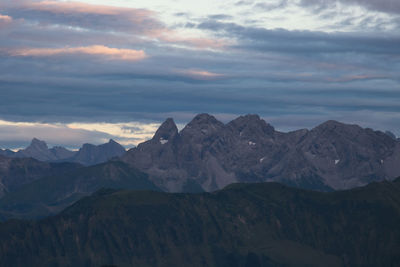 Scenic view of mountains against sky during sunset