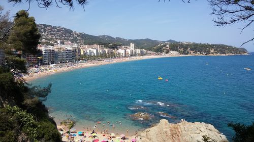 View of sea with buildings in background