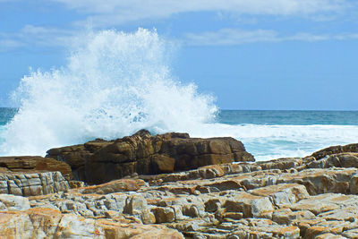 Panoramic view of sea against rocks