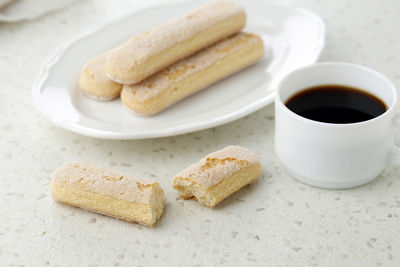 Lady fingers cookies savoyardi for making tiramisu cake. ingredient for traditional italian dessert.