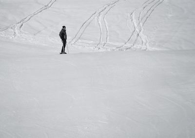 People on snow covered landscape
