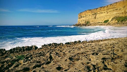 Scenic view of beach against sky