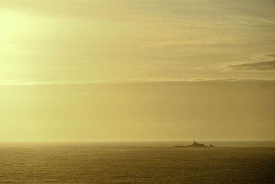 Scenic view of sea at sunset