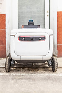 Automatic delivery robot for the transportation of goods and packages.futuristic robot electric car