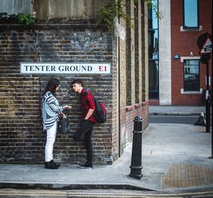 Full length of woman standing in city