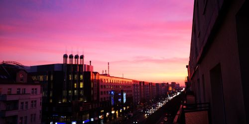 Panoramic view of buildings against sky during sunset