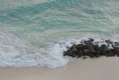 Waves breaking on rocks