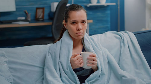 Portrait of businesswoman using mobile phone