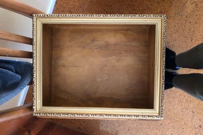 Low section of man standing at home