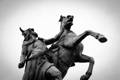 Low angle view of statue against clear sky