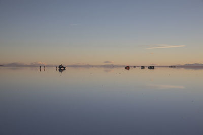 Cars over water in uyuni salar