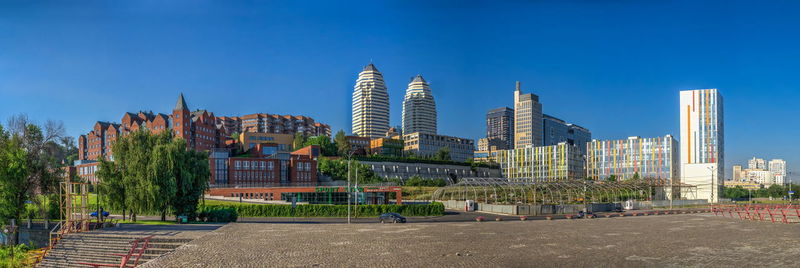 Modern buildings in the center of dnipro city in ukraine on a sunny summer day