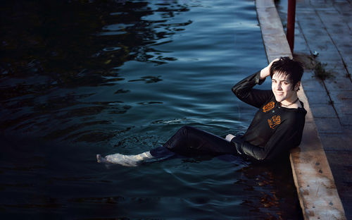 Portrait of young woman in boat