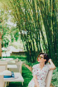 Woman sitting at outdoor restaurant