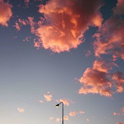 Low angle view of cloudy sky at sunset