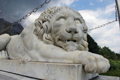 Low angle view of statue against sky