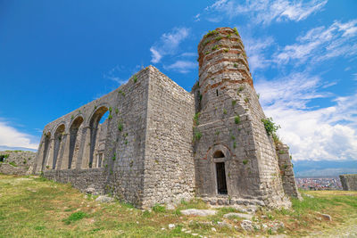 Low angle view of historic building against sky