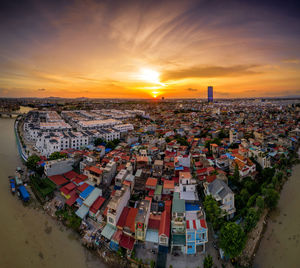 High angle view of townscape against sky during sunset