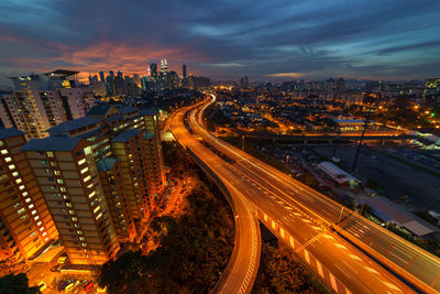 High angle view of illuminated cityscape at night