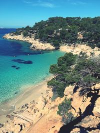 High angle view of sea shore against sky