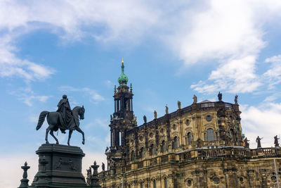 Low angle view of statue of building against sky