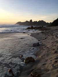 Scenic view of sea against sky at sunset