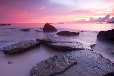 Scenic view of sea against sky at sunset