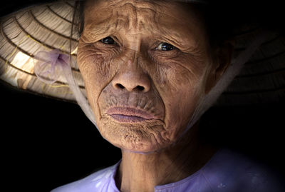 Close-up portrait of man wearing mask