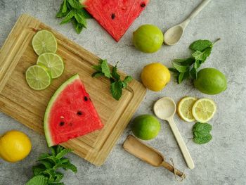 High angle view of fruits on cutting board